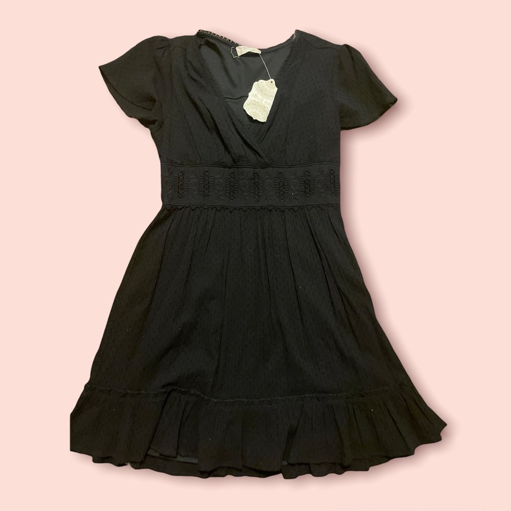 black ruffle dress